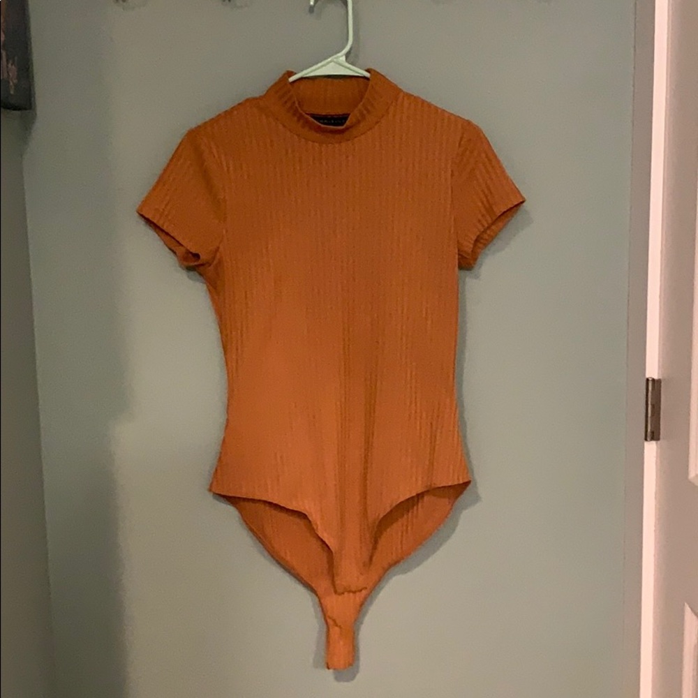 Burnt orange onesie